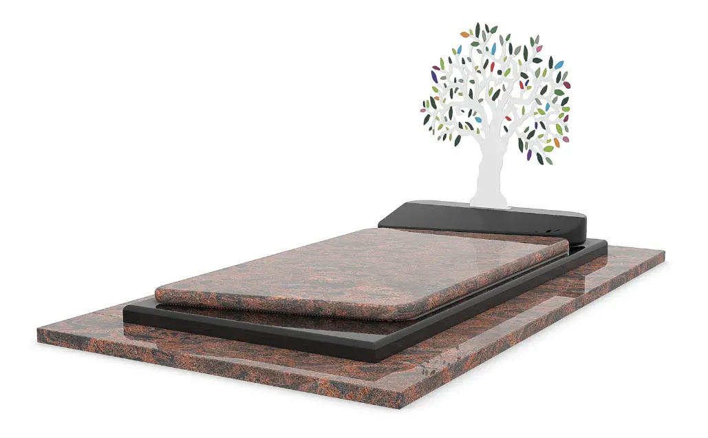 Pierre tombale en granite rose et noir surmontée d'une stèle en forme d'arbre coloré.